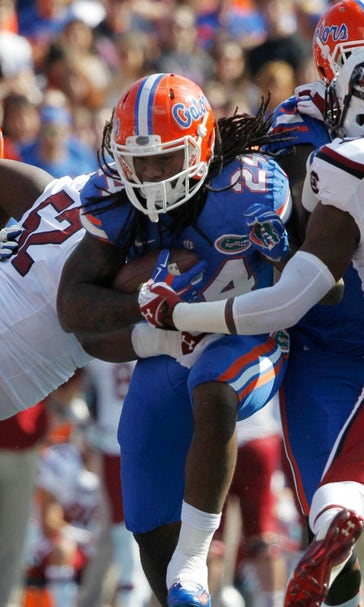 Gators knocked out of division contention with OT loss to South Carolina